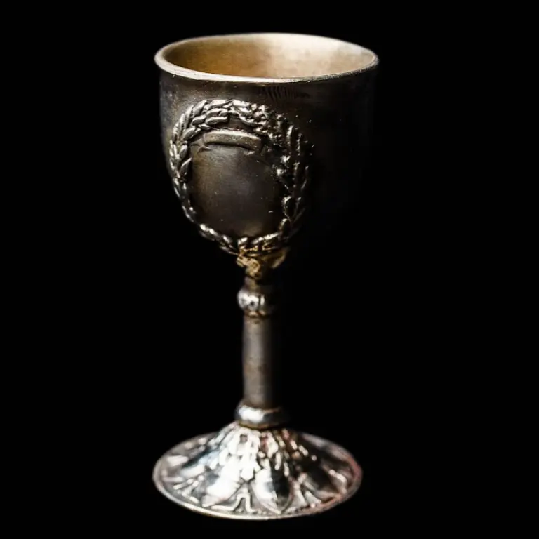 Small vintage cast bronze wine goblet